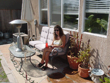 Heidi relaxing by the pond.